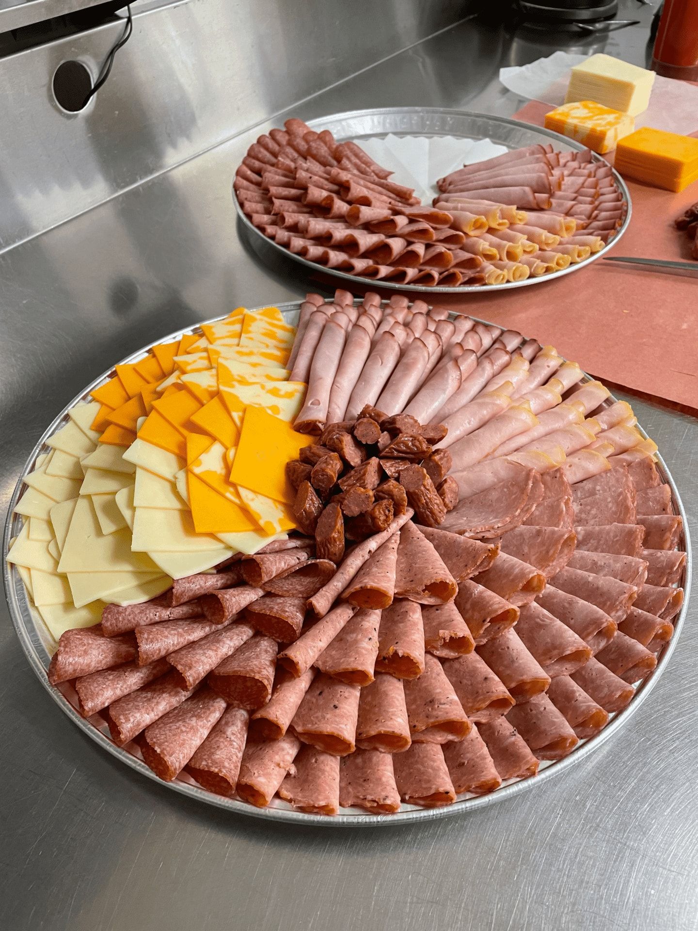 Evelyn's Sausage Kitchen in Shedden Ontario offers custom meat and cheese platters that include bite size or bun size options, as well as, platters of our delicious sub sandwiches.